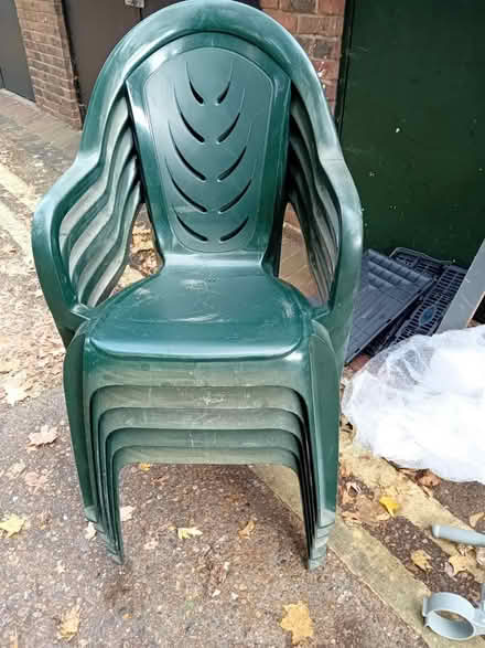 Photo of free Five green plastic garden chairs (Peckham) #1
