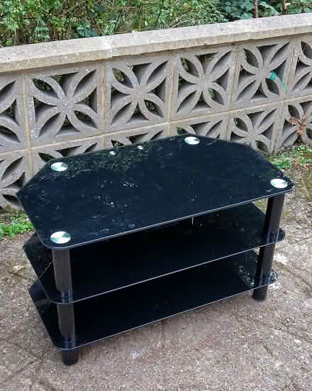 Photo of free Black glass TV stand (BH9) #1