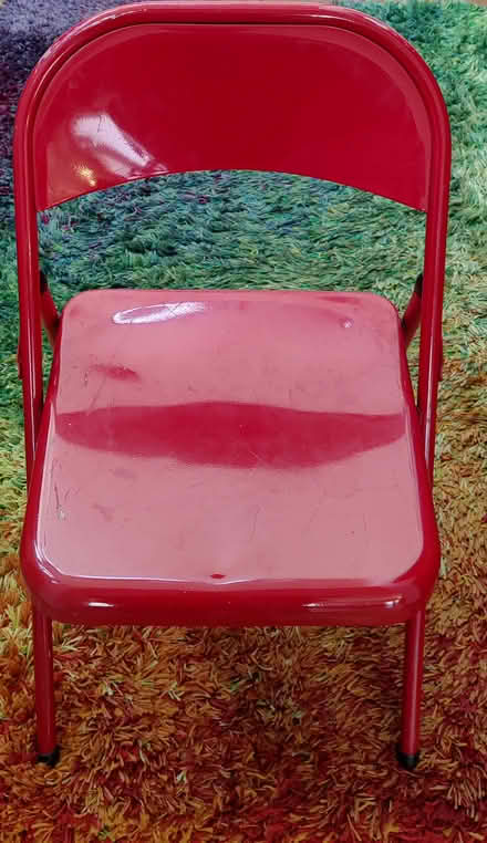 Photo of free Red metal folding chair ((south) Central Park - Denver) #1