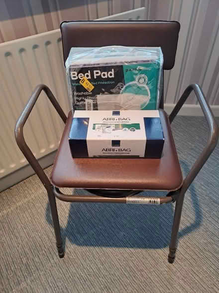 Photo of free Commode Chair with box of Liners & Bed Pad (one lot) (Harefield SO19) #1