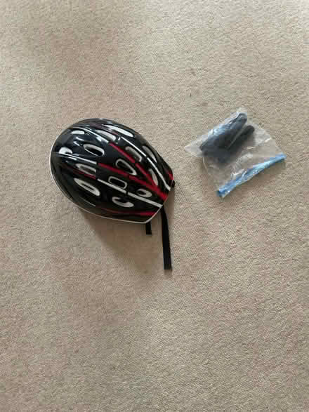 Photo of free Muddy fox child cycle helmet (Leckhampton GL53) #1