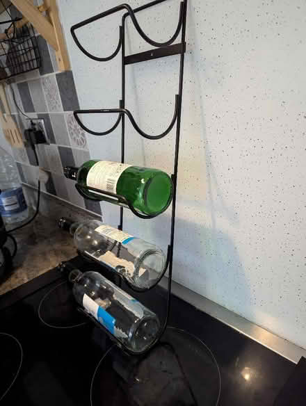 Photo of free 5 bottle wine rack ( wall hung) (Grangeway area NN10) #2