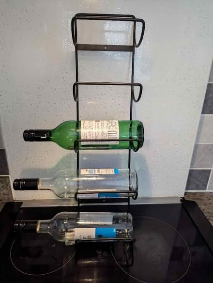 Photo of free 5 bottle wine rack ( wall hung) (Grangeway area NN10) #1
