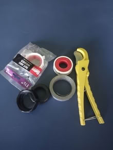 Photo of free PVC pipe cutter, hanging metal strap, plumbing odds #1