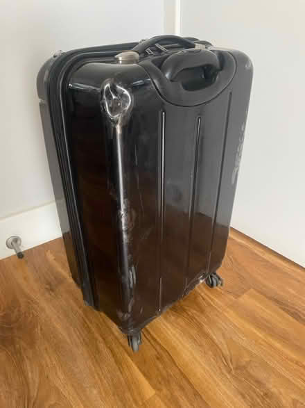 Photo of free Well used black suitcase (Wood Green N15) #4