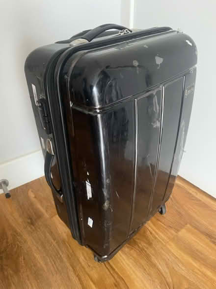 Photo of free Well used black suitcase (Wood Green N15) #3