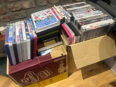 Photo of free Two boxed full of DVDs (Holywell Green HX4) #1