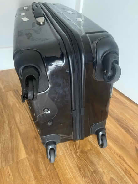 Photo of free Well used black suitcase (Wood Green N15) #2