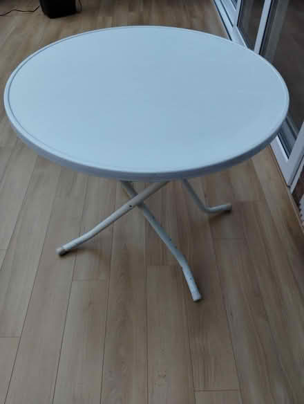 Photo of free Folding round white outdoor table (B91 - Central Solihull) #2
