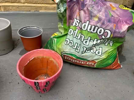 Photo of free Small to medium plant pots & soil (SW9) #1