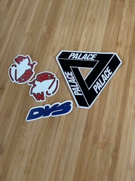 Photo of free Clothing logo stickers (Ware SG12) #1