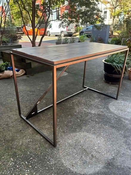 Photo of free Tall table (629 constitution ave ne) #1