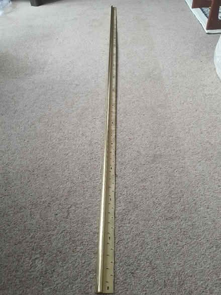 Photo of free Gold coloured carpet threshold (Stroud central) #1