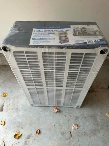 Photo of free 5 shelf storage unit 24” deep new (Columbia, MD) #1