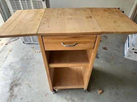 Photo of free Rolling table with fold down leaves (Columbia, MD) #1
