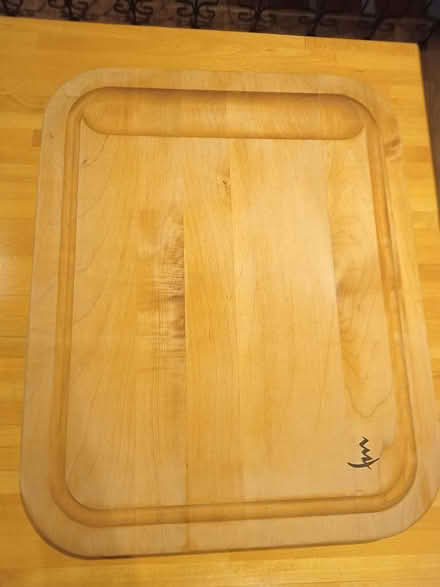 Photo of free Large wooden cutting board (Near Warden and Lawrence) #1