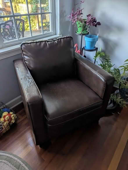 Photo of free "leather" chair (63rd& main, DG) #1