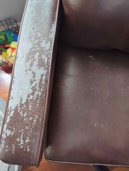 Photo of free "leather" chair (63rd& main, DG) #2