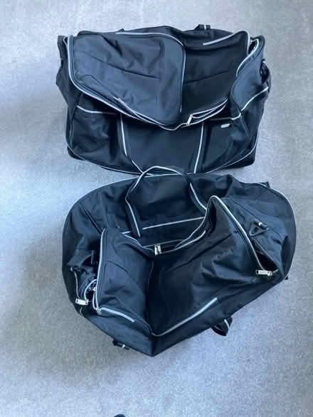 Photo of free 2 x large black suitcases (Carlisle CA2) #1