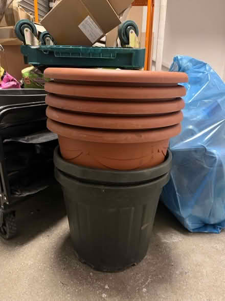 Photo of free Five brown plant pots (Great Portland Street W1) #1