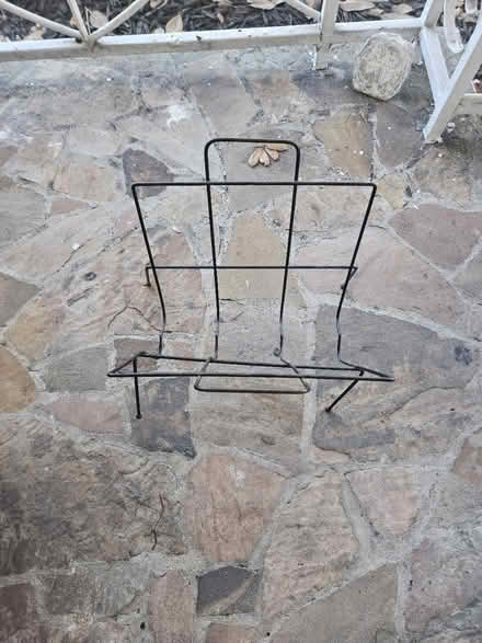 Photo of free Black magazine stand (St. Pete) #1