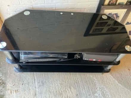 Photo of free Large Black glass tv stand (Furzton, Milton keynes) #1