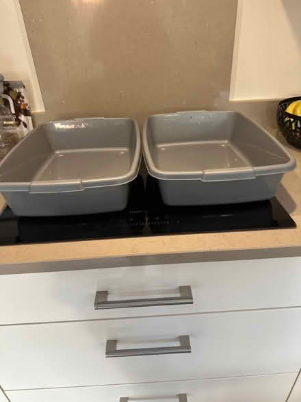 Photo of free 2 brand, new, large, grey cat litter trays (Woodford SK7) #1