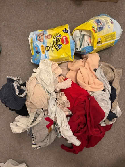Photo of free Girls clothes age 1-3 and some unused nappies (Roehampton SW15) #1