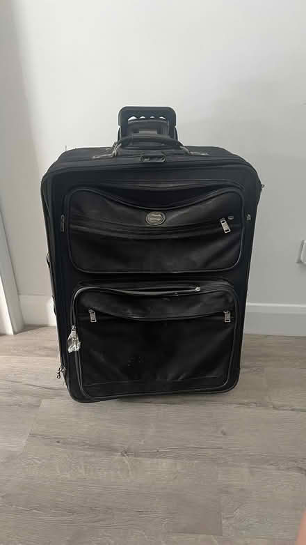 Photo of free Large suitcase (West Ham Park E15) #1