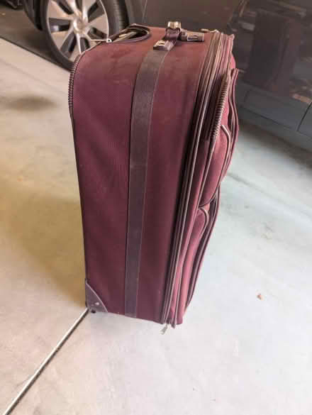 Photo of free Large burgundy suitcase (Terra Vista Way and Pierce Ave) #2
