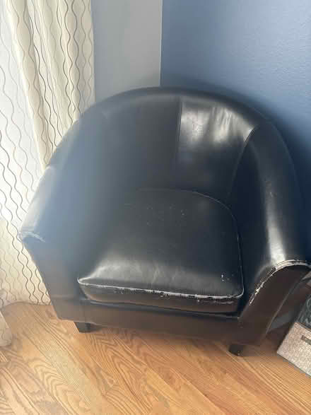 Photo of free Black leather arm chair (Centennial) #1