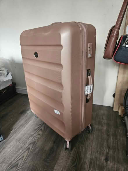 Photo of free Large pink suitcase (Hackenthorpe S12) #1