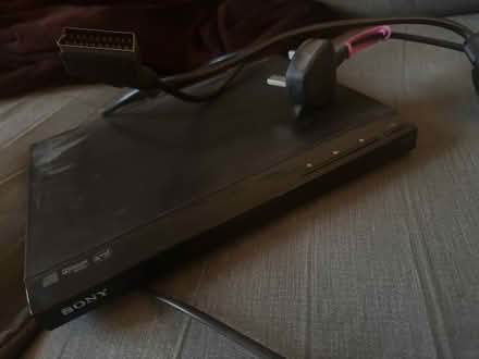 Photo of free DVD Player and lots of DVDs (Sw13 9ea) #1