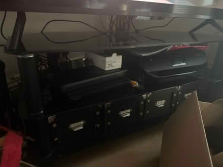Photo of free Corner TV stand only (black glass) (Sw13 9ea) #1