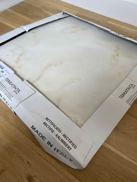 Photo of free 3 large calacatta mat tiles (Earls Court SW5) #1