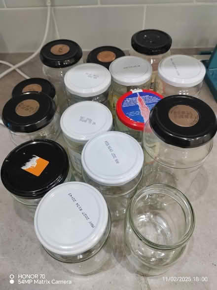 Photo of free 17 glass jars, one missing led (BD22) #1