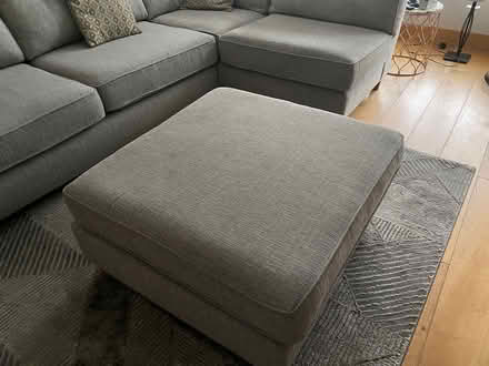 Photo of free Medium grey corner sofa with pouffe (Templeogue) #2