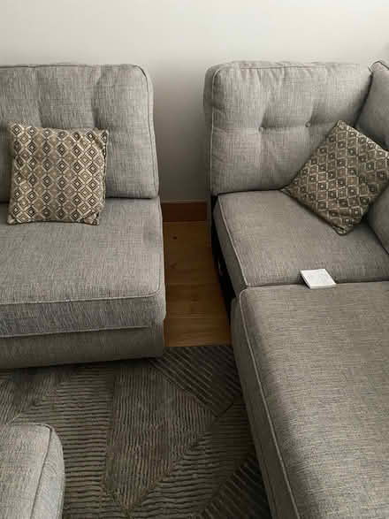 Photo of free Medium grey corner sofa with pouffe (Templeogue) #4