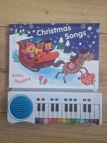 Photo of free Christmas piano book and two reindeer plush toys (Isleworth TW7) #1