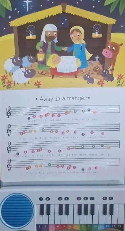 Photo of free Christmas piano book and two reindeer plush toys (Isleworth TW7) #3