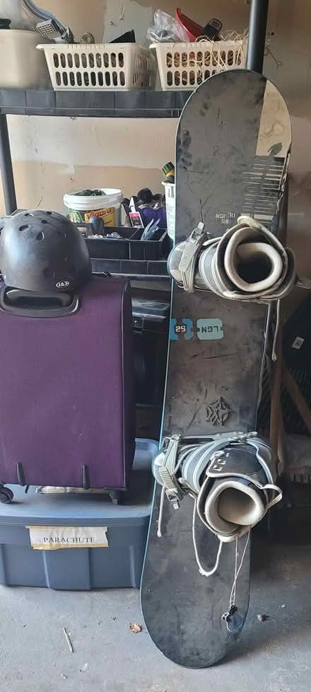 Photo of free snowboard, boots, helmet (131 Wesley Avenue) #1