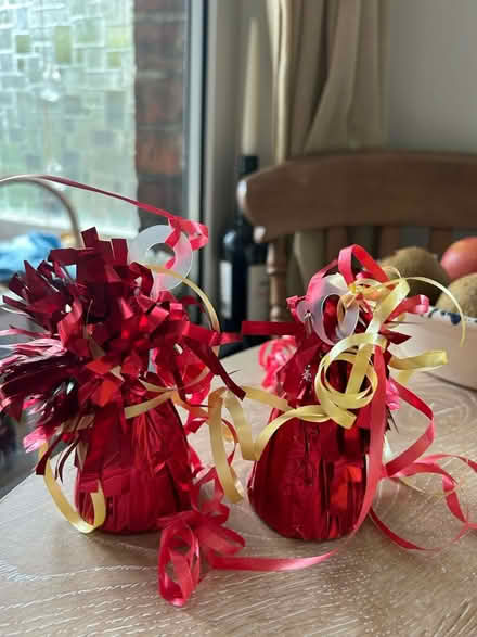 Photo of free Red balloon weights (GU21 4) #1