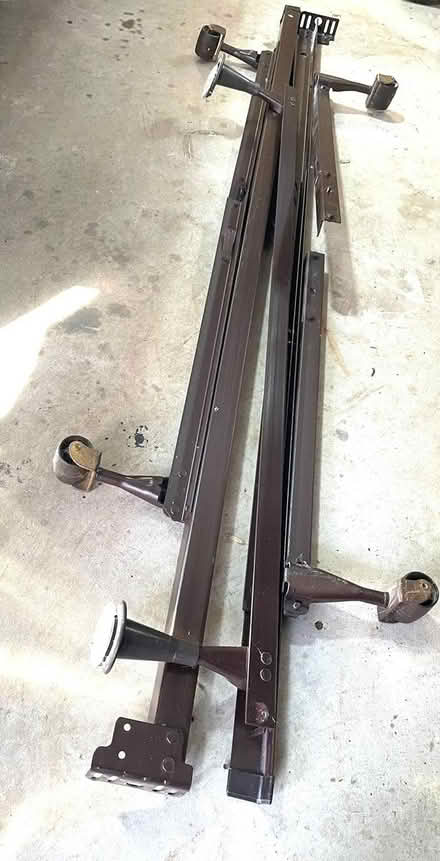Photo of free KING METAL BED FRAME with wheels (Laytonsville) #1