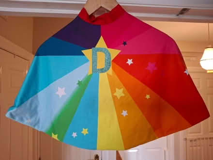 Photo of free Children's dress up cape and mask with letter D on (Surrey Heath GU16) #1