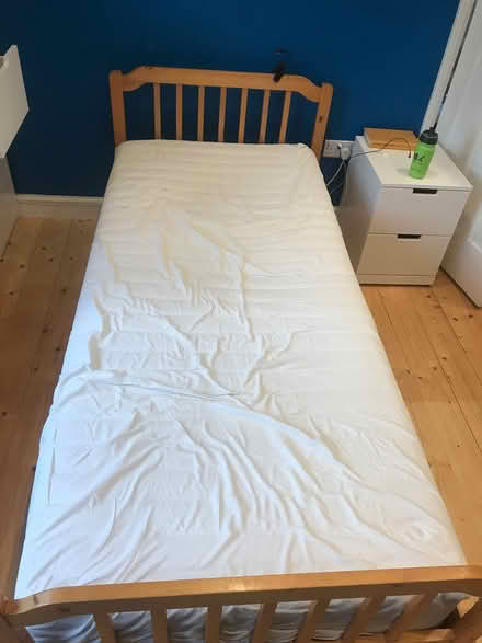Photo of free Single IKEA wood bed with mattress (SG6) #2