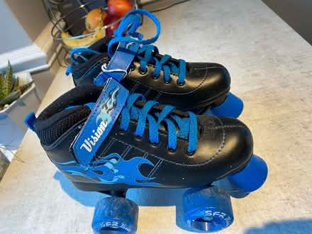 Photo of free Size child 13 blue roller boots (WA5) #1