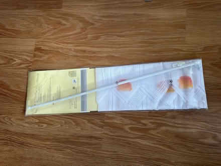 Photo of free Net curtain with rod and fixings (Old Woking GU22) #4