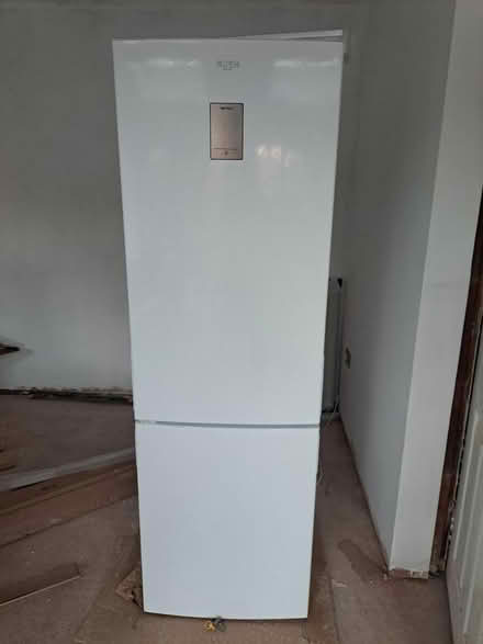Photo of free Bush tall white fridge freezer (Heswall) #1