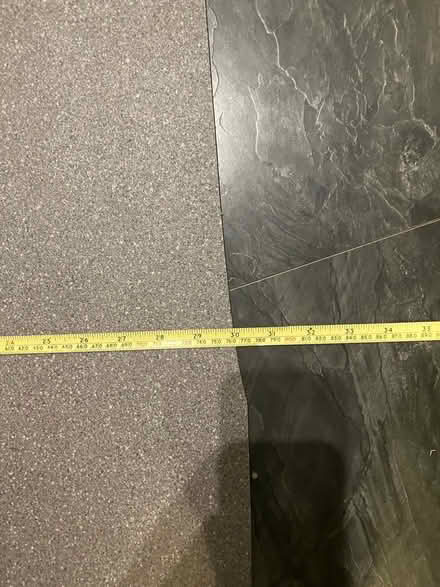 Photo of free Grey vinyl floor piece (Lowther CA10) #2