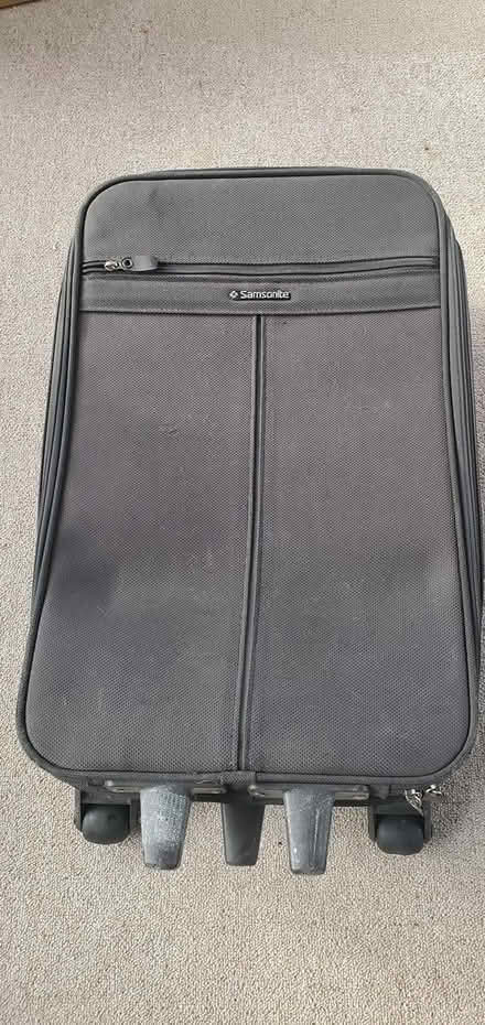 Photo of free Rolling suitcase - Large (Springfield - Scenic Hills) #1